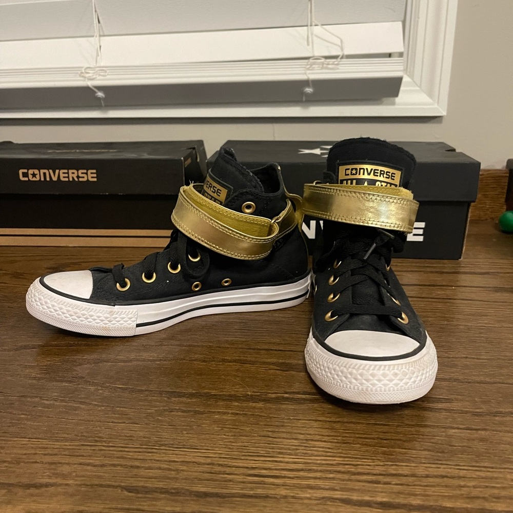 Black and Gold high top converse
